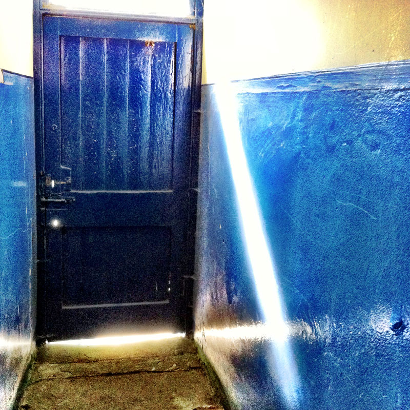 Ray of light and blue door. Clarity filter in Camera+, Taken with iPhone.