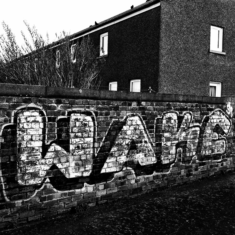 Urban graffiti in Portobello, Edinburgh. Applied the retro Ansel filter from Camera+.