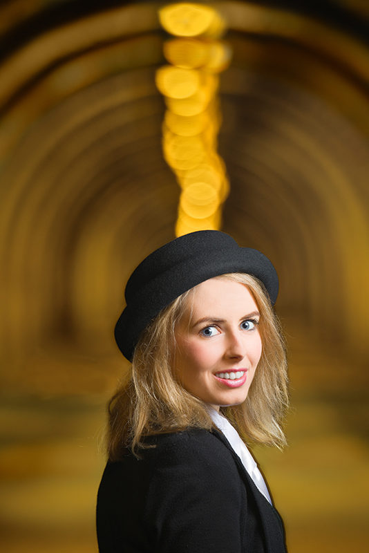 Model with Innocent Railway Tunnel, Edinburgh as background Close-up shot using a 400mm telephoto lens.