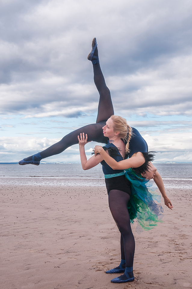 Amy and Saya acrobatic pose on Portobello beach