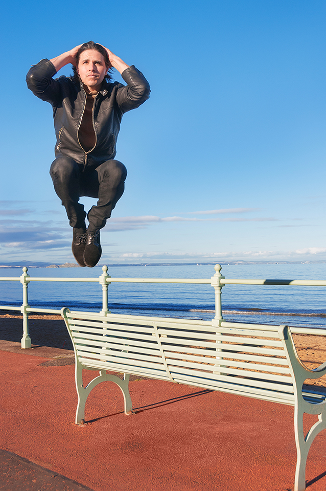 Paul Distefano jumping from a bench in Portobello