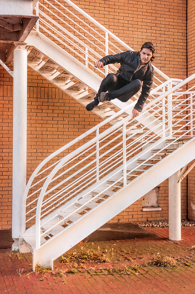 Dancer Paul Distefano jumping from a staircase in Portobello