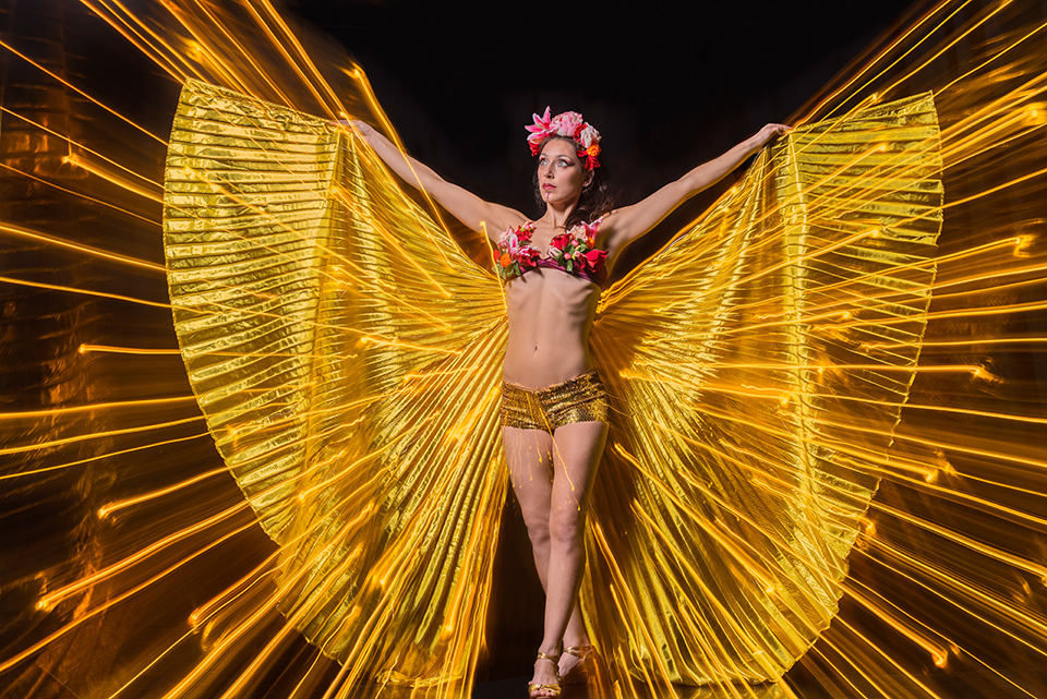 Circus artist Zoja Dravai in a red and yellow costume