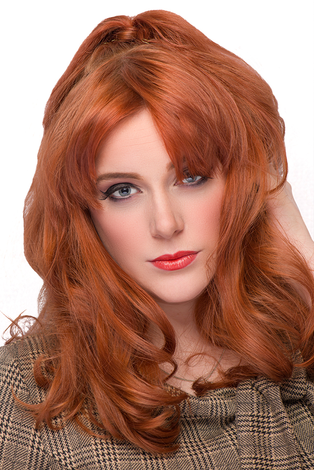 Beauty photograph of redhead with big hair