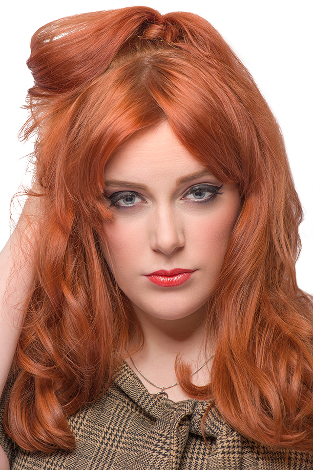 Beauty photograph of redhead with big hair