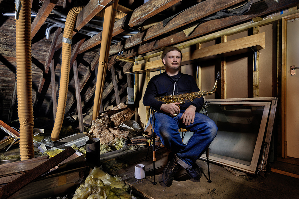 saxophone player in an attic