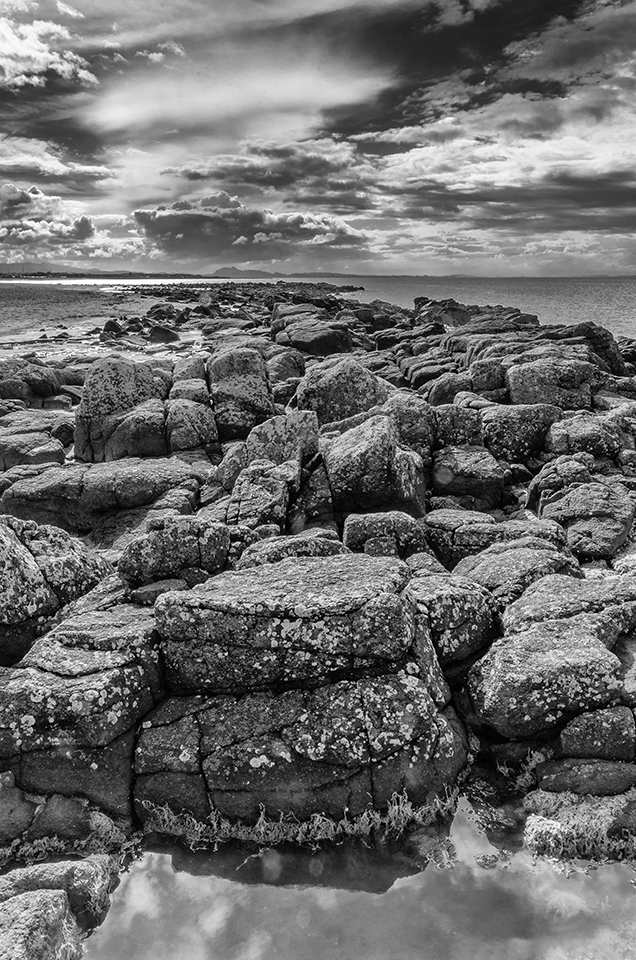 Rocks in Londniddry Bents with a dramatic sky