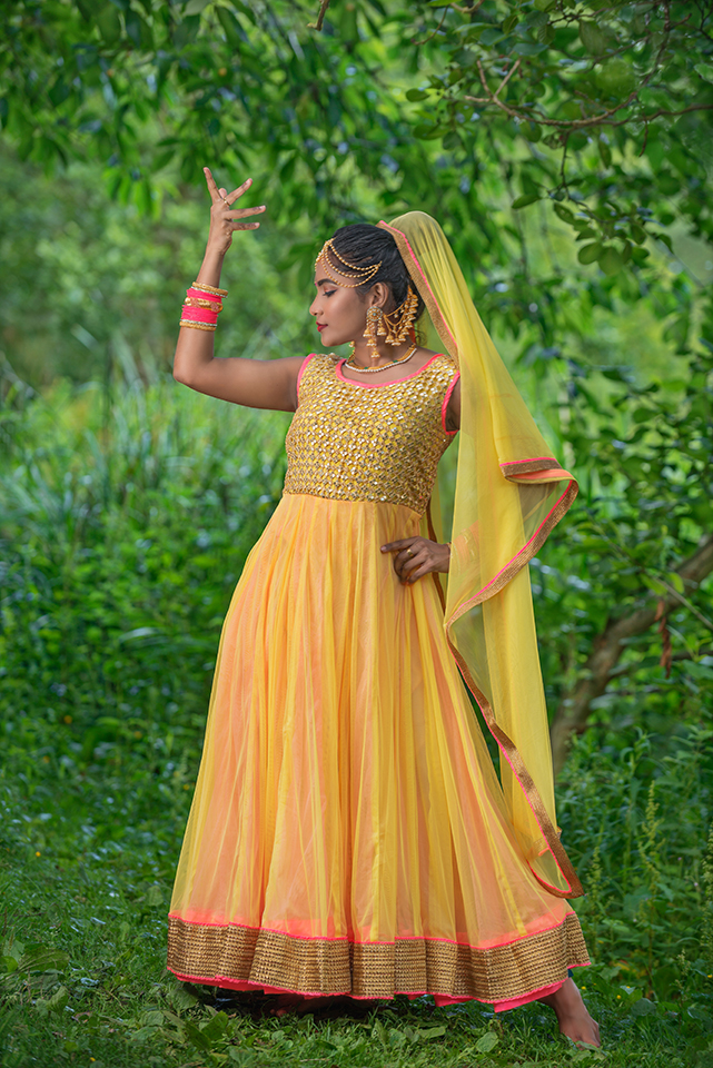 Full length photograph of dancer in traditional Indian Bollywood dress