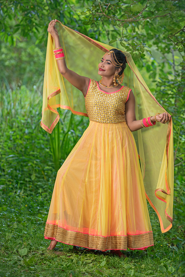 Full length photograph of dancer in traditional Indian Bollywood dress