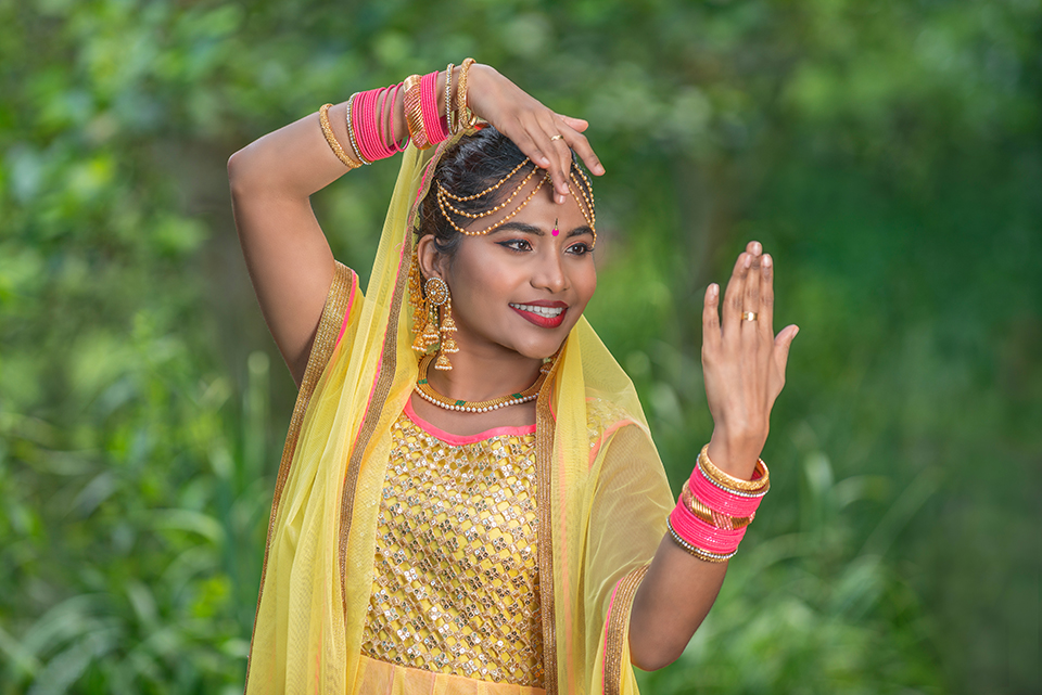 Half-length photograph of dancer in traditional Indian Bollywood dress