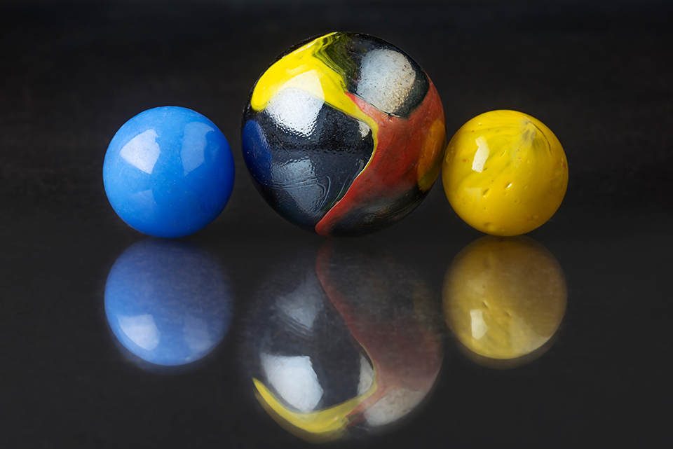 Big marble and small marbles