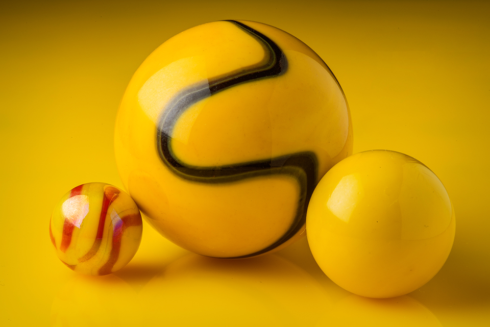 Three yellow marbles
