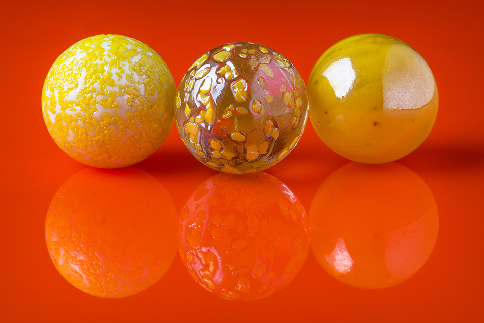 Three yellow marbles