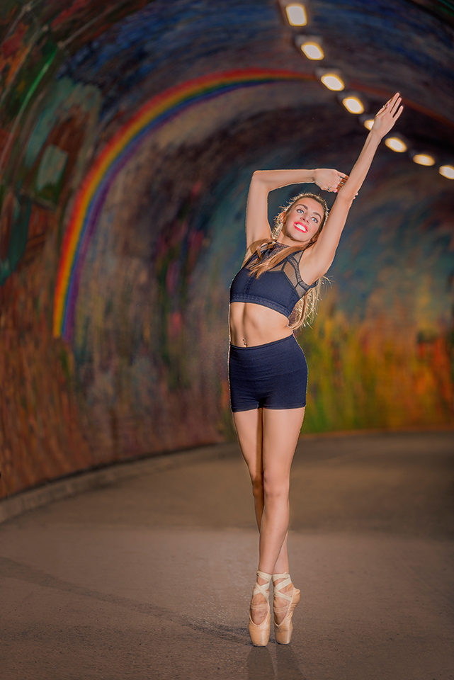 Nicole doing a dance pose in the middle of the tunnel take 3