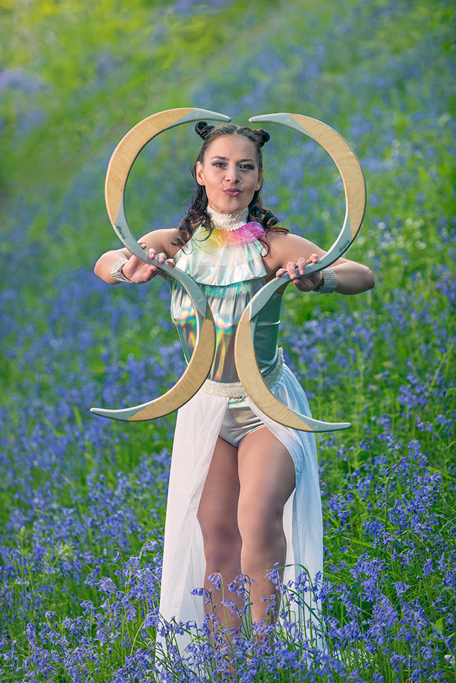 Model posing in a field of bluebells
