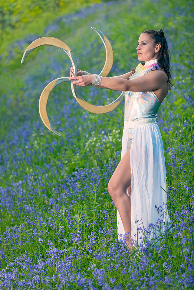 Model posing in a field of bluebells