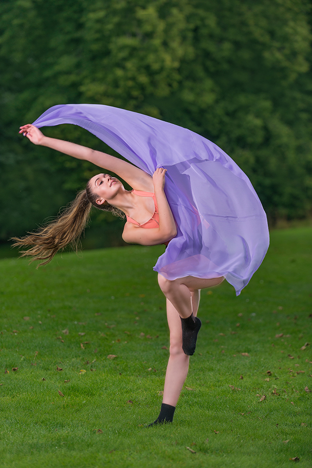 Dance student Macy waving a piece of fabric at the Celrk Estate, Penicuik, image no 1