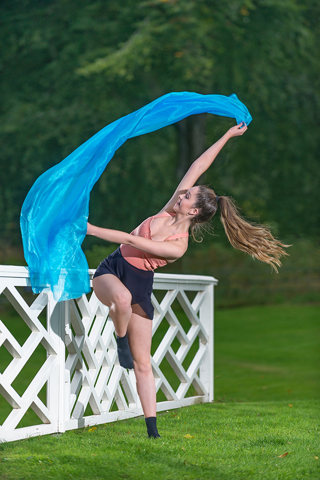 Dance student Macy waving a piece of fabric at the Clerk Estate, Penicuik, image no 8