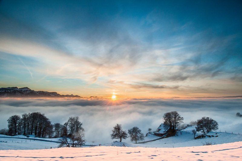 During the winter months, there often is a low cloud cover over Lake Geneva, Switzerland. Climbing Mont Pelerin allows one to rise above the clouds and enjoy some stunning scenery.