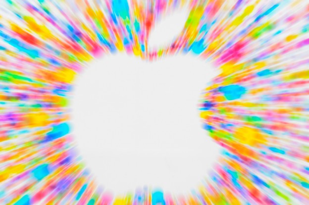 Photograph of Apple logo on the wall surrounding the New Edinburgh Apple store, zooming during a long exposure