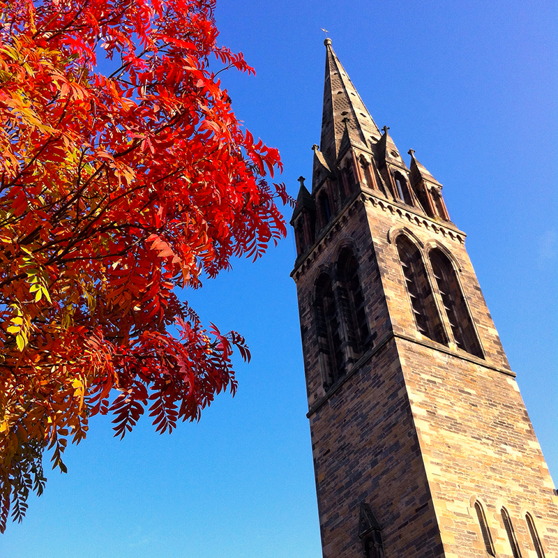 St Peter's church, Edinburgh, fall colours, tree, and blue sky. Shot on iPhone.