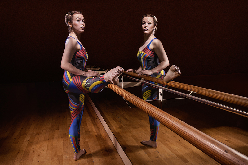 Light painting of a dancer and her reflection in a mirror at dance Base Edinburgh