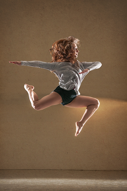 Female dancer Kaja Jurkowska jumping. Profile picture