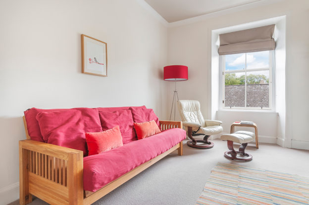 living room on Canon street, Edinburgh, with red sofa