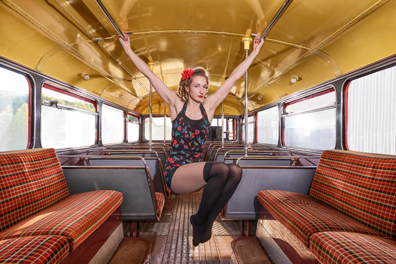 Circus artist Rosella Elphinstone inside a vintage double-decker bus