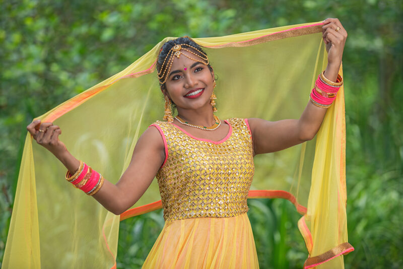 Half-length photograph of dancer in traditional Indian Bollywood dress