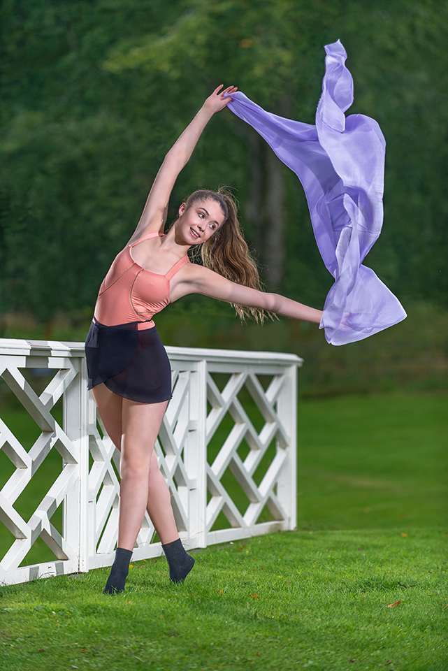 Dance student Macy waving a piece of fabric at the Clerk Estate, Penicuik, image no 5